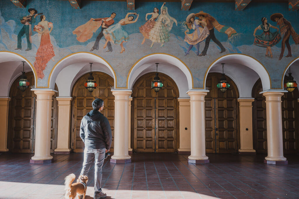 historic Arlington theatre with dog in Santa Barbara